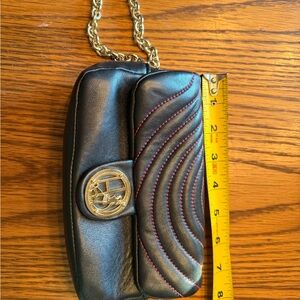 Henri Bendel Black Clutch/wristlet with Gold Chain snd pink interior